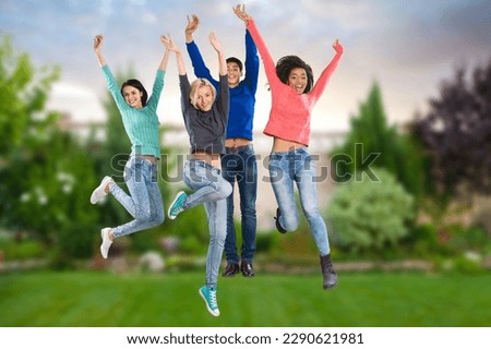 Diverse group of happy young friends have fun
