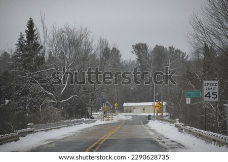 the landscape of a road that has been closed in the winter