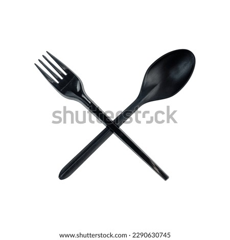 plastic spoon and fork on a white background