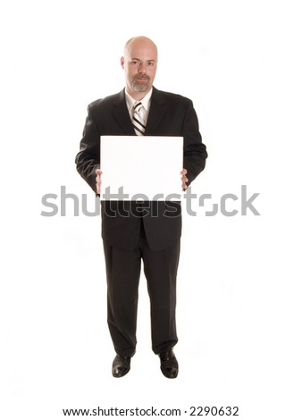 Stock photo of a well dressed businessman holding a blank sign, ready for your copy.