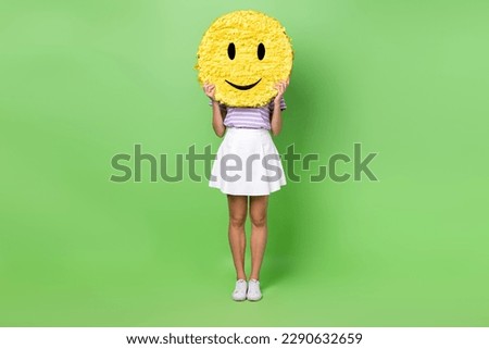 Full length photo of funky funny girl wear violet t-shirt big smiley cove close face isolated green color background