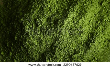 Matcha green tea powder textured background Royalty-Free Stock Photo #2290637629