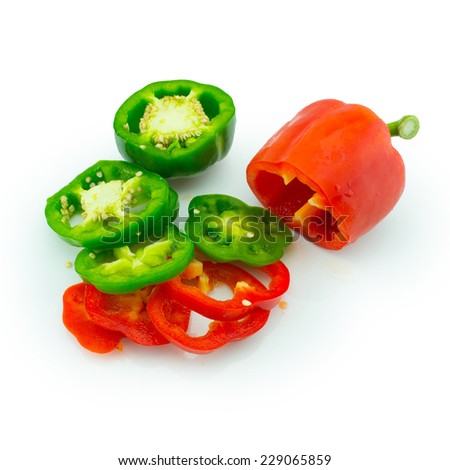 Cut Two Paprika and two color green and red in isolated white background , NOT MAKE COLOR