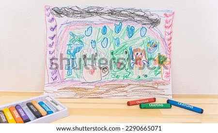A child's drawing of a rainy day and a frog