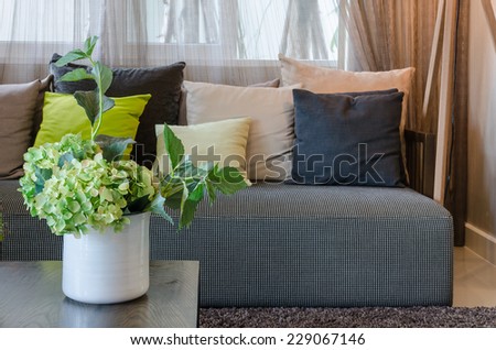 plants in white ceramic vase in living room