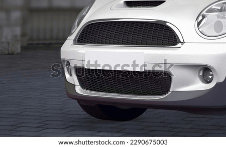 Blank License Plate On vehicle. empty License Plate. no text. place for text, space for text. blank white license plate on a car with copy space. Blank License Plate On car. Royalty-Free Stock Photo #2290675003
