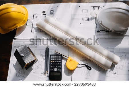 Architect concept, Architects working with blueprints in the office, Vintage Effect Royalty-Free Stock Photo #2290693483