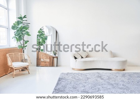Modern, white minimalist interior. Modern interior design for posters in the living room layout with a white sofa with space to copy. High quality photo Royalty-Free Stock Photo #2290693585