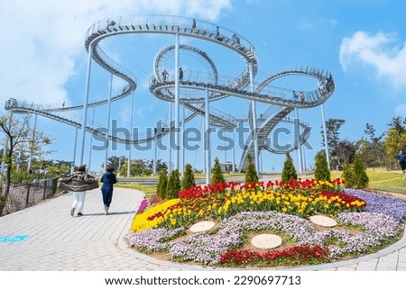 Posco unveiled Korea’s largest walkable art installation named Space Walk on April 8, 2023. The 333-meter curved steel track that looks like a roller coaster stands landmark in the Hwanho Park, Pohang Royalty-Free Stock Photo #2290697713