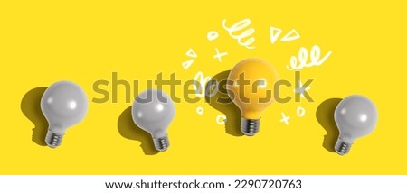 One out unique idea light bulb concept - Flat lay Royalty-Free Stock Photo #2290720763