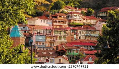 Colorful traditional houses with wooden carved balconies in the Old Town of Tbilisi, Georgia. Royalty-Free Stock Photo #2290749921