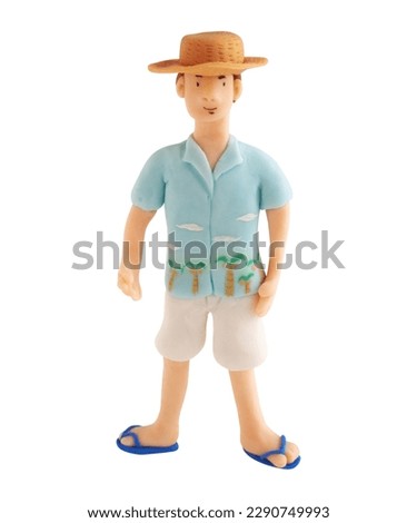 Man in summer fashion wearing straw hat and aloha shirt(This is a photo of a clay work)