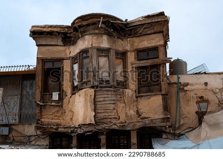 Old house, facade of a building ruin in old town of Damascus, Syria Royalty-Free Stock Photo #2290788685