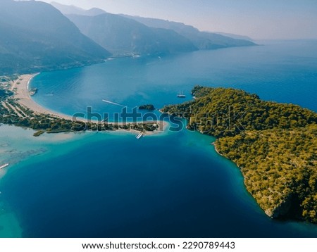 Aerial drone photo of Ölüdeniz, Fethiye, Turkey, showcasing the turquoise waters, picturesque coastline, and beautiful beaches of this popular summer destination. Royalty-Free Stock Photo #2290789443