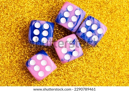 Blue and pink marble dices  as gambling concept for design purpose Royalty-Free Stock Photo #2290789461