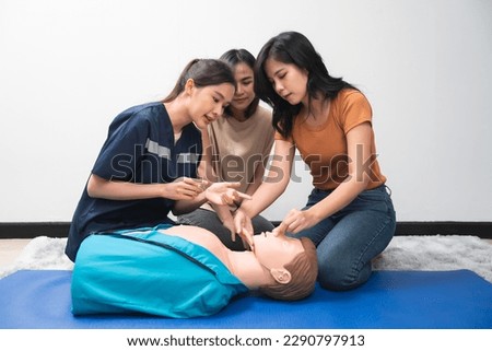 CPR Training ,Emergency and first aid class on cpr doll, Cardiopulmonary resuscitation, One part of the process resuscitation on unconscious person. Royalty-Free Stock Photo #2290797913
