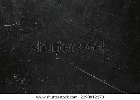 White dust and scratches on black background great for overlays Royalty-Free Stock Photo #2290812173