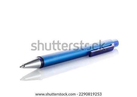 Side view of a blue ballpoint pen, isolated on a white background. Close up. Royalty-Free Stock Photo #2290819253