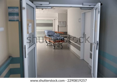04.17.2023 wroclaw, poland, Hospital bed in the corridor in the clinic. Royalty-Free Stock Photo #2290819257