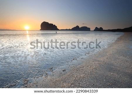 Beautiful sunset at the sea , at sunset time , Pakmeng Beach, Trang , Thailand Royalty-Free Stock Photo #2290843339