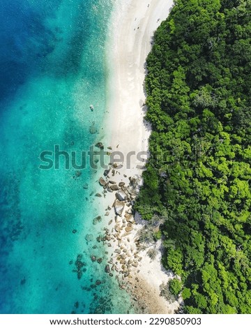 An Aerial Drone Photo of Fitzroy Island, Cairns, Tropical North Queensland, Australia by Phoebe Ayarat Burke April 2023  Royalty-Free Stock Photo #2290850903