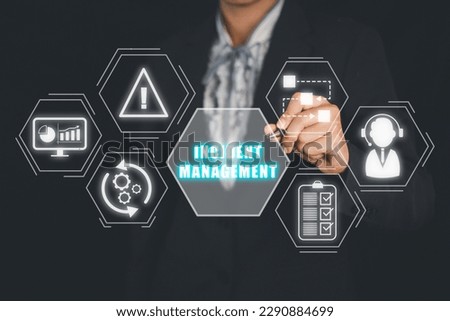 Incident Management process Business Technology concept, Business person hand touching incident management icon on virtual screen. Royalty-Free Stock Photo #2290884699