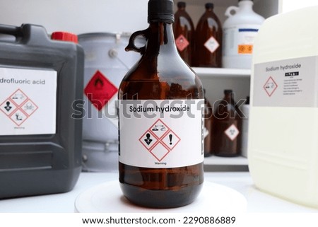 sodium hydroxide, Hazardous chemicals and symbols on containers, chemical in industry or laboratory  Royalty-Free Stock Photo #2290886889