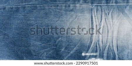 torn denim fashion jeans design texture. Blue denim jeans texture banner with copy space for text design background. Canvas denim fashion texture. Panoramic fashion banner Royalty-Free Stock Photo #2290917501