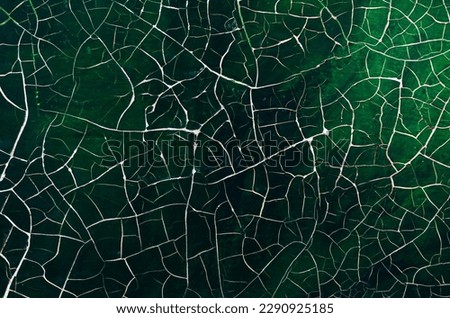 cracked paint on old picture close up abstract background art restoration pattern