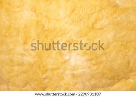 Glass wool insulation as a background. Texture Royalty-Free Stock Photo #2290931107