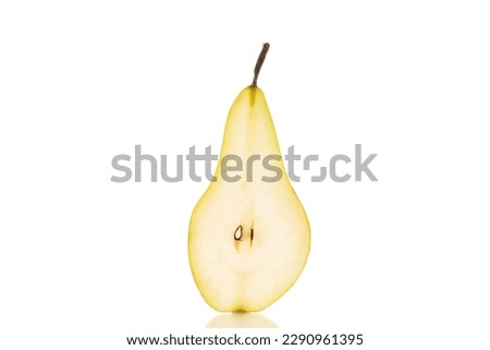  One half of a ripe organic pear, macro, on a white background.

