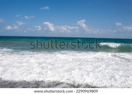 waves sand and sea. Nature landscape view of beautiful tropical beach and sea in sunny day. Beach sea space area