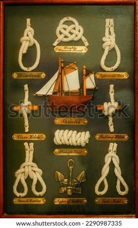 Miniature model nautical knots on a frame