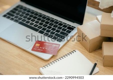 Picture of credit card and laptop computer. making online shopping online. Online shopping concept. Payment Transaction at Computer using Credit Card.