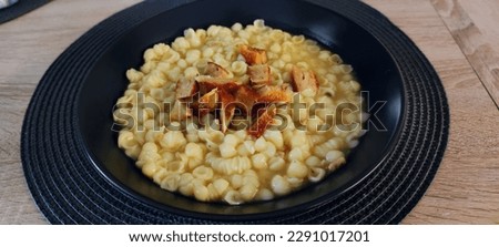Close-up view of soup with pasta shells, photo Royalty-Free Stock Photo #2291017201