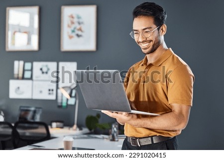 Happy, laptop and corporate man in office smile, confident and excited against blurred wall background. Idea, vision and asian businessman online for planning, goal and design agency startup in Japan