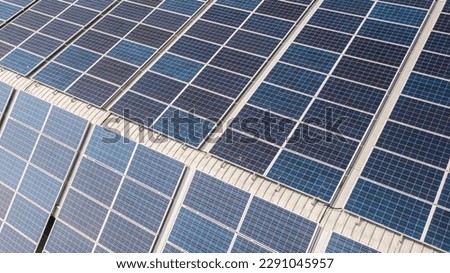 Technology solar cell, Solar cell on the roof of factory industry, Solar panels on factory roof, Top view taken by drone Royalty-Free Stock Photo #2291045957