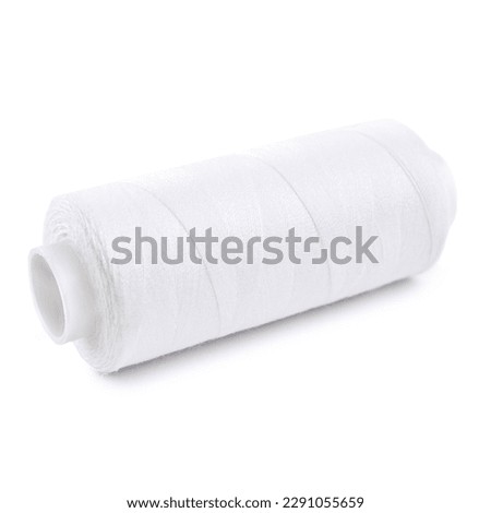 Sewing threads. Spool of thread with on white isolated background. Multicolor sewing threads background. Royalty-Free Stock Photo #2291055659