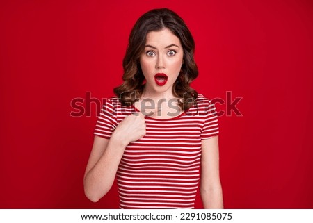 Portrait of impressed gorgeous lady open mouth point fingers self herself isolated on red color background