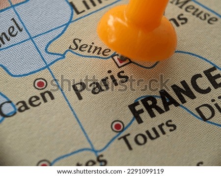 closeup picture of paris highlighted in the world map
