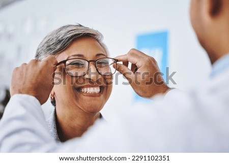 Optometry, smile and woman with prescription glasses, optician and helping client with product. Female person, employee and optometrist assist with eyewear, clear vision and buying new spectacles Royalty-Free Stock Photo #2291102351