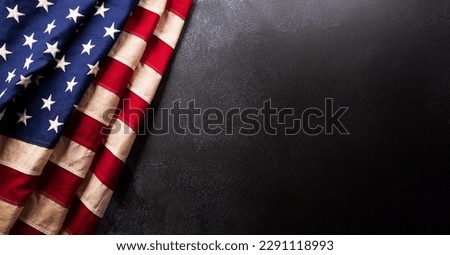 Happy Memorial day concept made from American flag  on dark stone background.