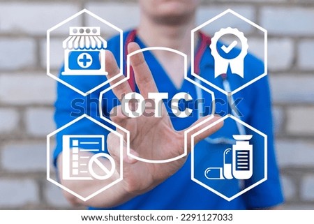 Doctor using virtual touch screen presses abbreviation: OTC. OTC Over The Counter Medical Pharmacy Concept. Royalty-Free Stock Photo #2291127033