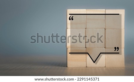 Quote box frame in wooden cube stack with copy space. Quotation text info design blank icon. Bubble, Mark speech, Talk, Label, Comment chat square, chat.