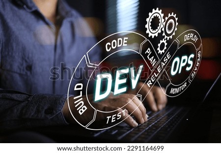 Agile developer or programmer is working on laptop with dev ops cycle virtual screen. IT operations, high software quality and software development. Agile programming development concept. Royalty-Free Stock Photo #2291164699