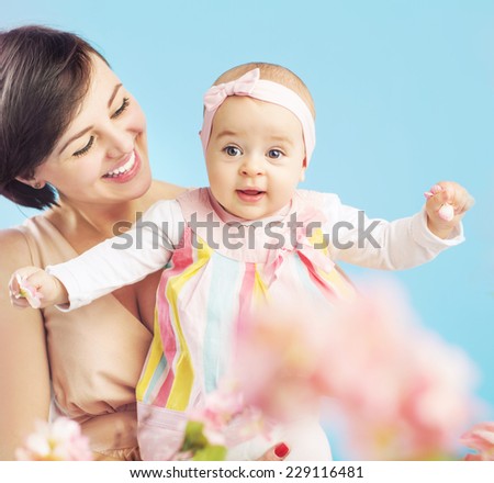 Smiling Mother and Baby