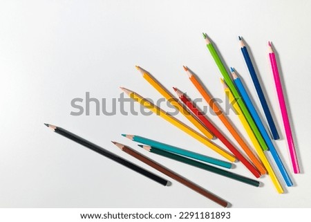 Arrangement Color pencils set in bulk on isolated white background Royalty-Free Stock Photo #2291181893