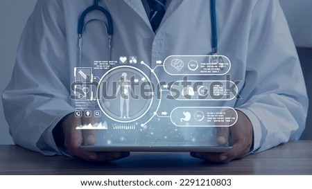 Medical technology.Doctor used tablet for medical record of patient on interface.Digital healthcare and network.medical technology and futuristic concept. Royalty-Free Stock Photo #2291210803