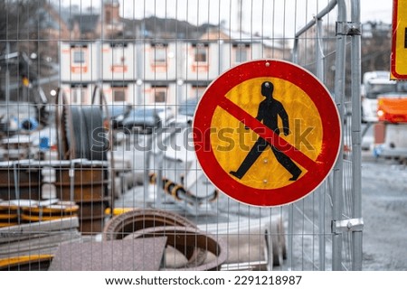 Pedestrians prohibited sign by road works