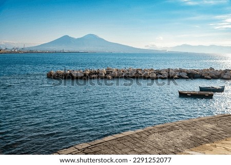 Vesuvius seen and fish boats from the seafront of Naples, Italy Royalty-Free Stock Photo #2291252077